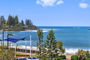 Absolute Beachfront Rolling Surf Resort